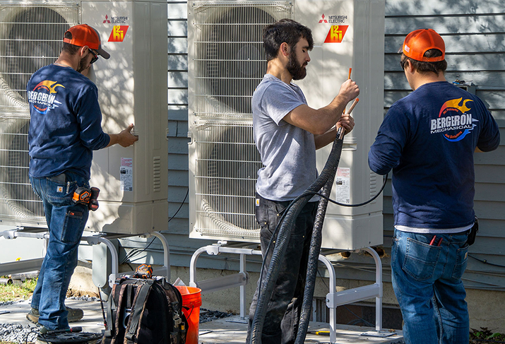 Vermont HVAC technicians installing air conditioners