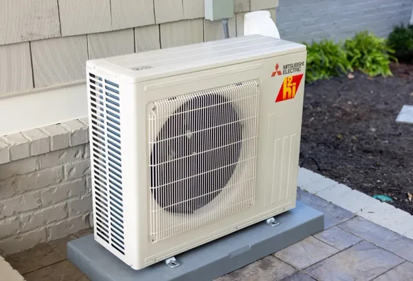 Heat pump unit outside New Hampshire home