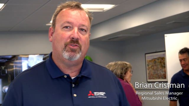 Heat pump installation New Hampshire technician talking