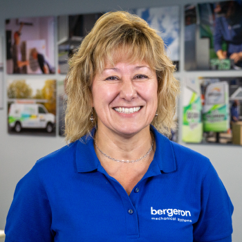 Technician smiling Bergeron mini-split installation New Hampshire