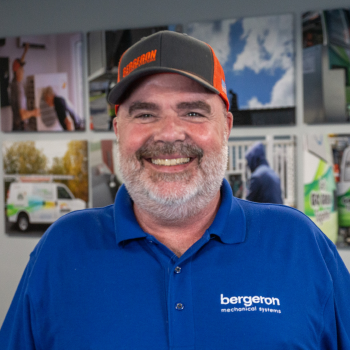 Vermont HVAC technician smiling indoors