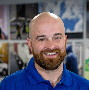 Vermont HVAC technician smiling indoors