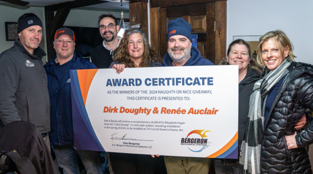 Vermont HVAC team holding award certificate